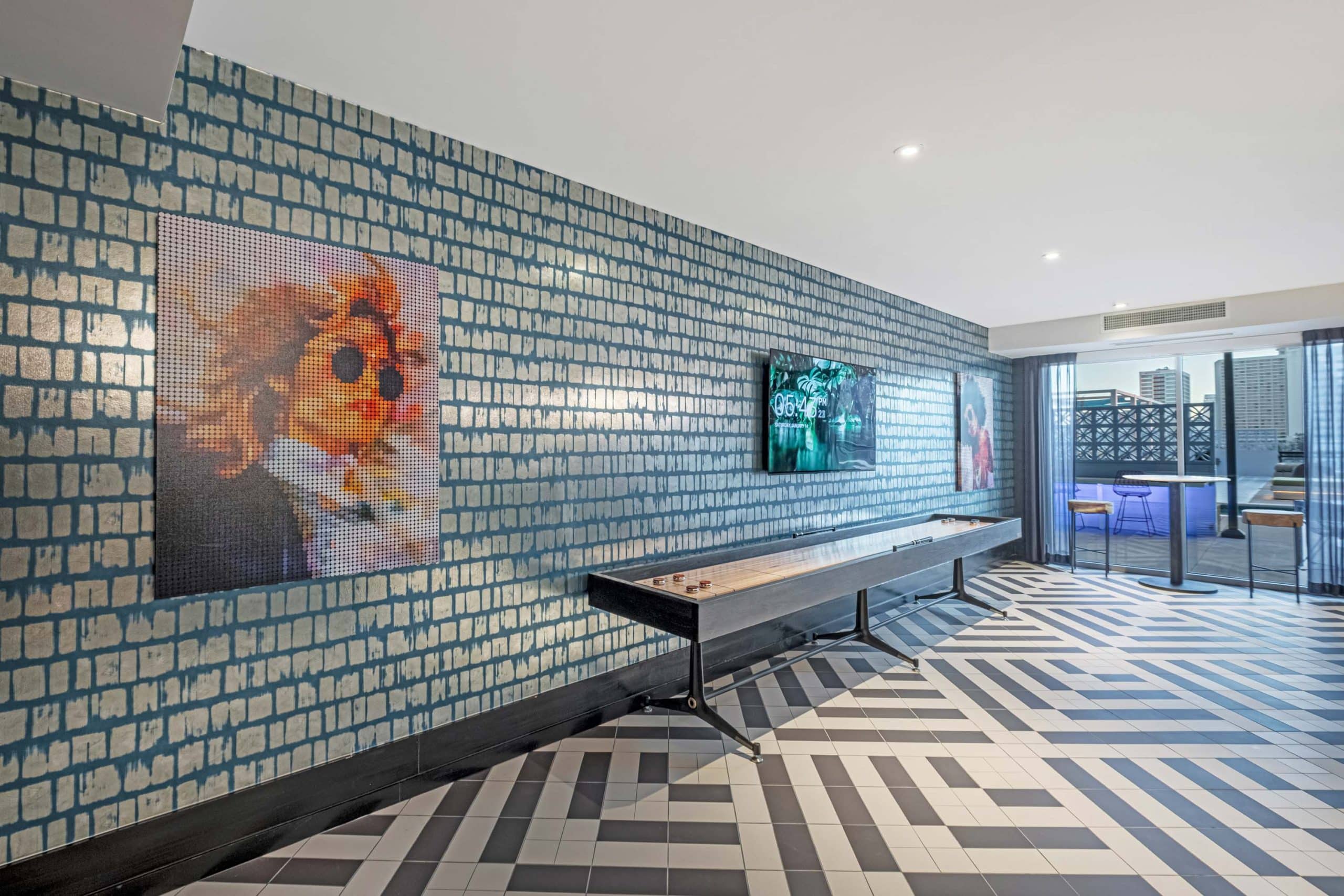 Furnished clubroom with shuffleboard